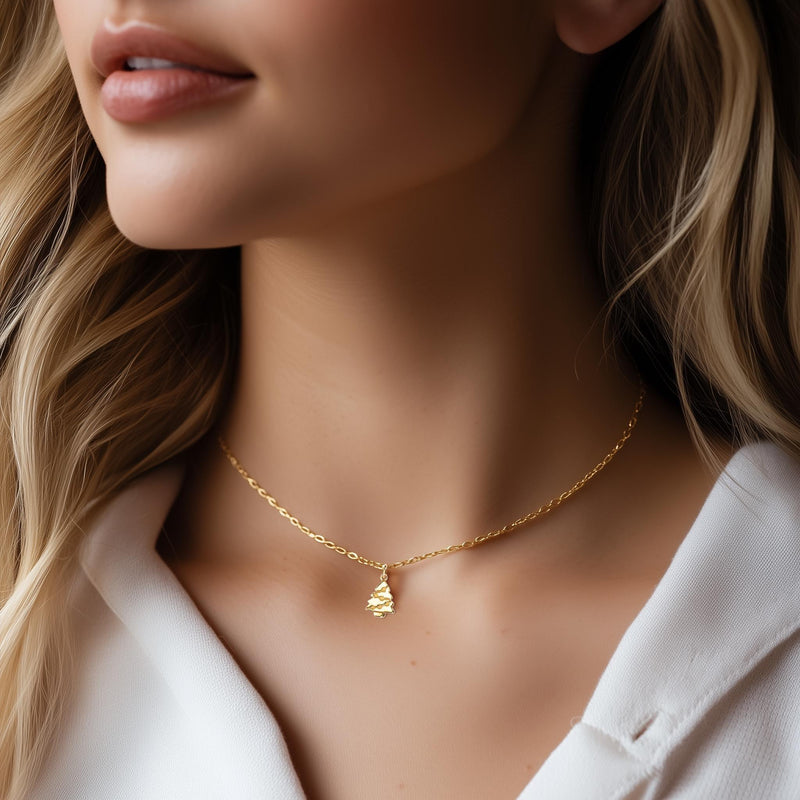 Fine gold chain necklace with a small tiered Christmas tree pendant (6 of 11)