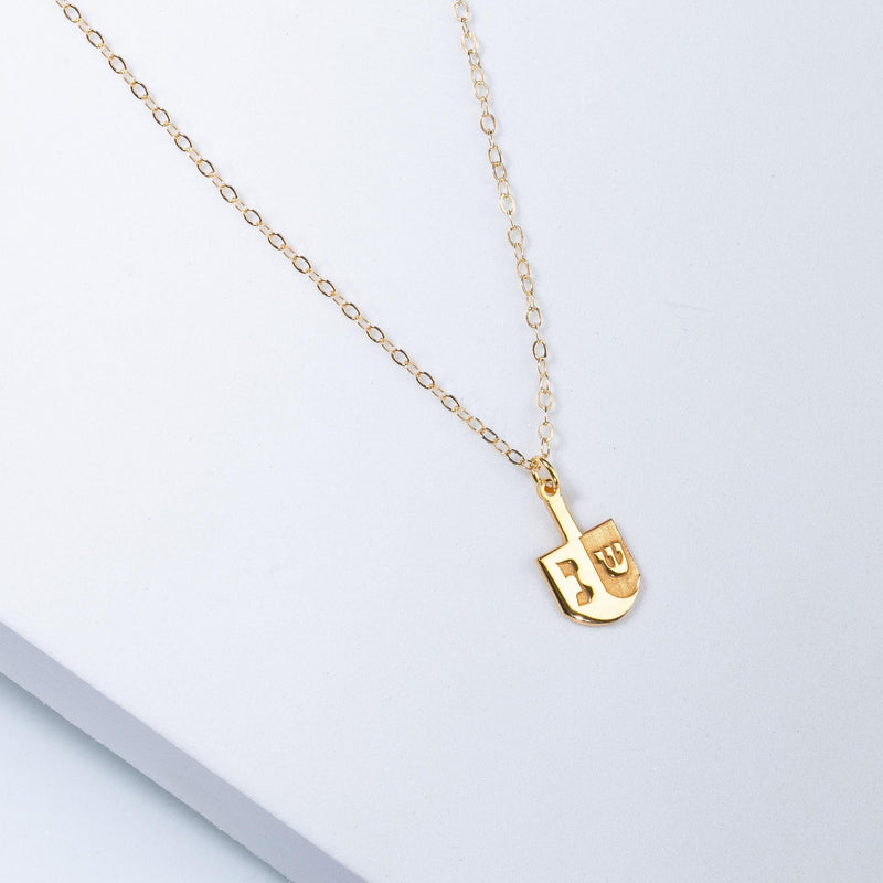 Small dreidel pendant on a thin gold cable chain necklace (4 of 7)