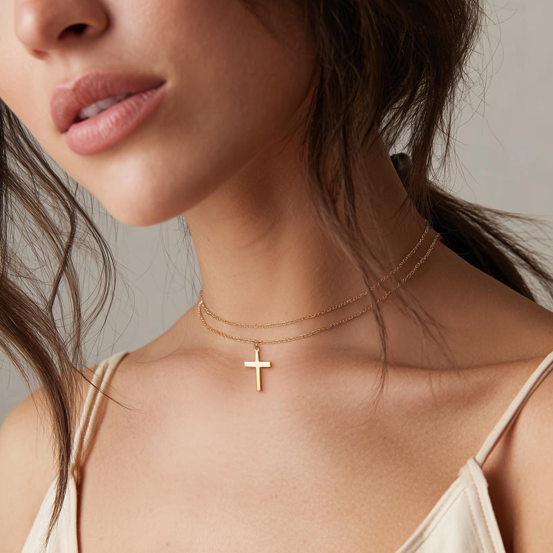 Fine gold chain necklace with a small plain cross pendant (13 of 16)