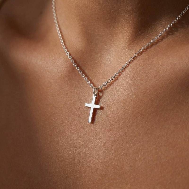 Fine gold chain necklace with a small plain cross pendant (3 of 16)