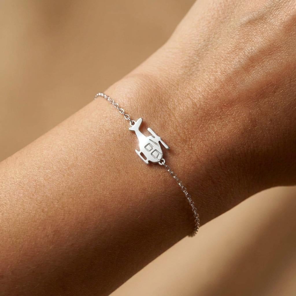 Fine chain bracelet with a small gold helicopter charm (2 of 7)