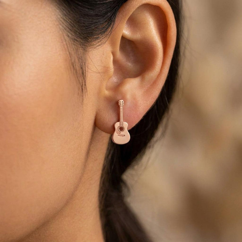 Pair of tiny gold acoustic guitar stud earrings with a slim body and neck (4 of 7)