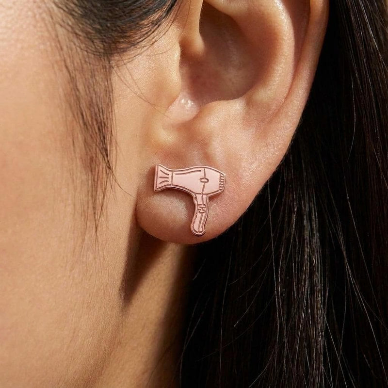 Pair of gold stud earrings shaped like a hair dryer with a curled cord (6 of 9)