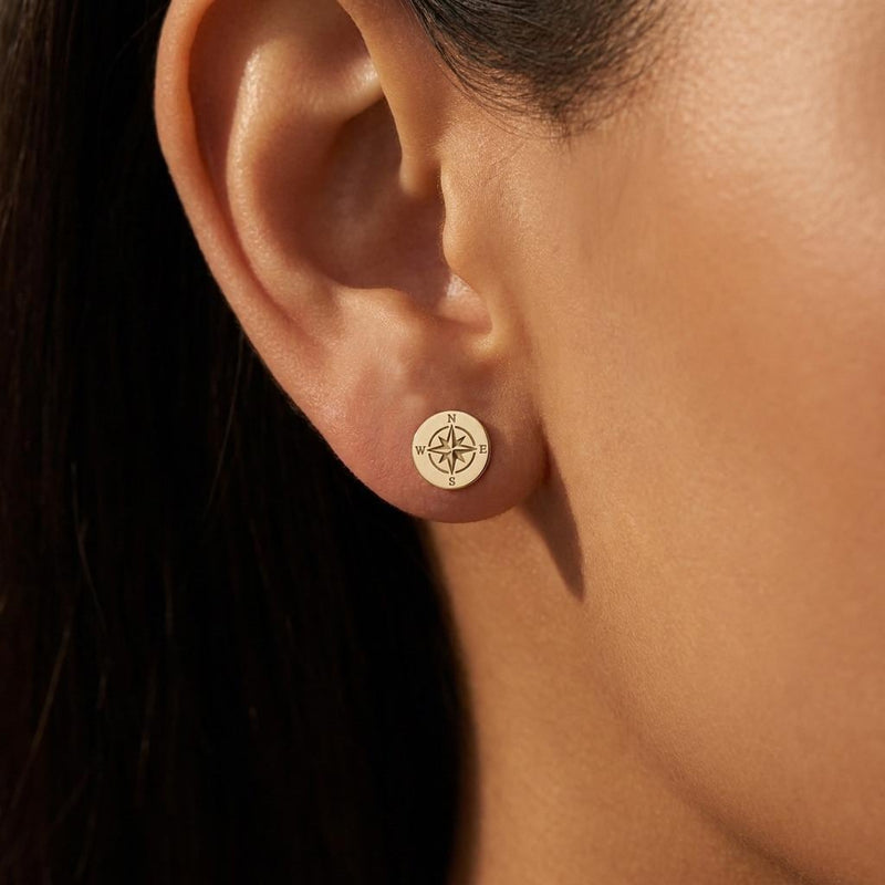 Pair of very small gold compass rose stud earrings with four points. (3 of 9)