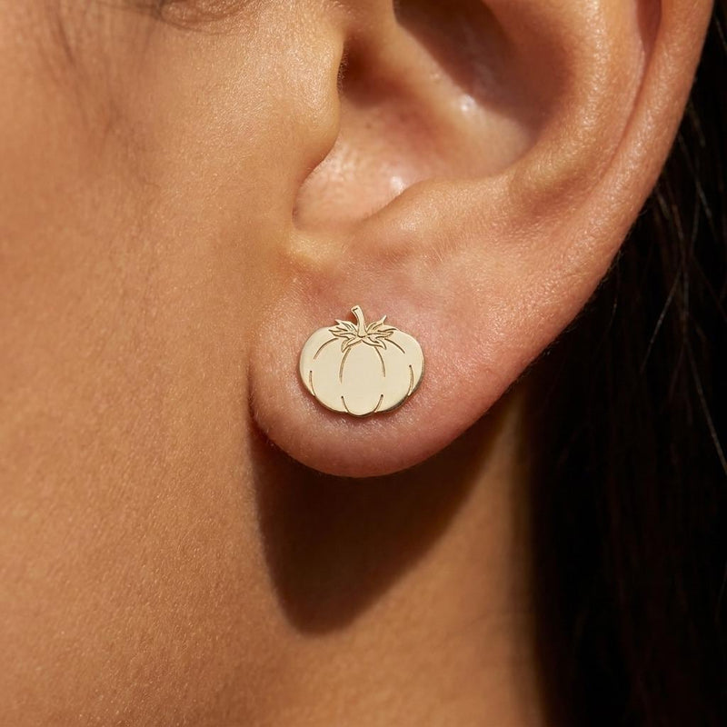 Pair of small gold tomato stud earrings with ribbed bodies and tiny stems (3 of 10)