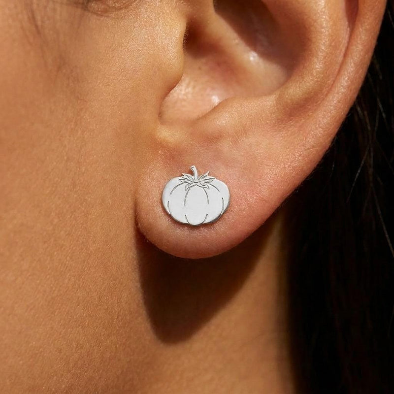 Pair of small gold tomato stud earrings with ribbed bodies and tiny stems (5 of 10)