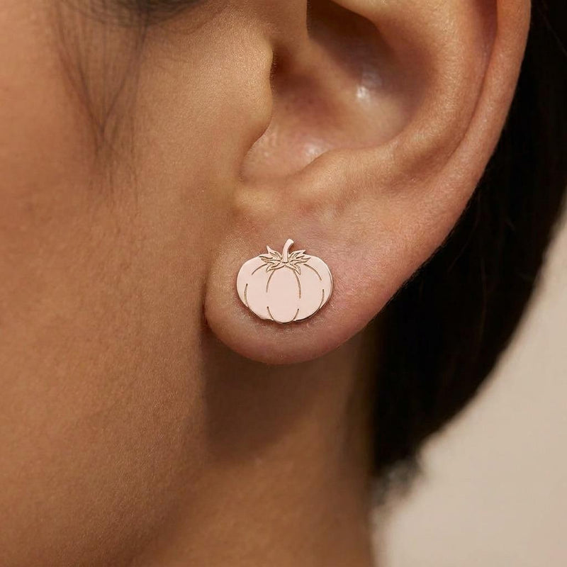 Pair of small gold tomato stud earrings with ribbed bodies and tiny stems (6 of 10)