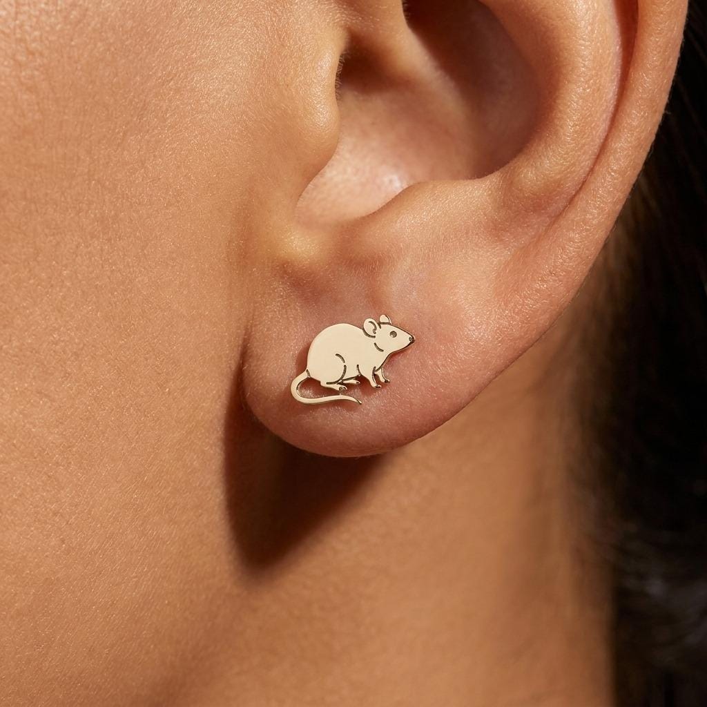 Pair of small gold rat stud earrings with round ears and long curved tails. (2 of 7)