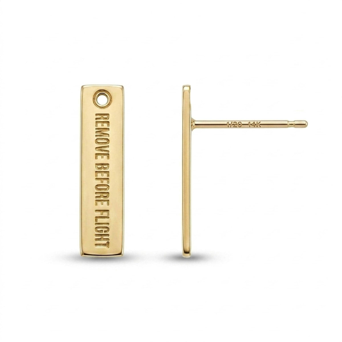 Pair of long narrow gold aviation tag stud earrings with lettering cut across.