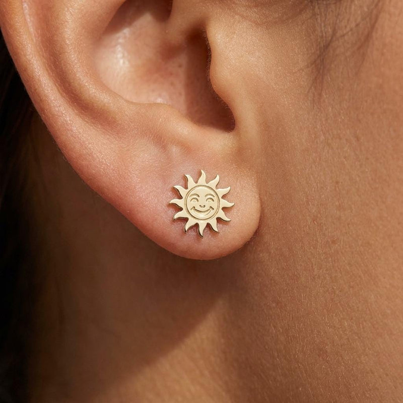 Mismatched gold sun and crescent moon stud earrings on posts (4 of 9)