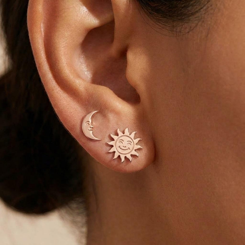 Mismatched gold sun and crescent moon stud earrings on posts (6 of 9)