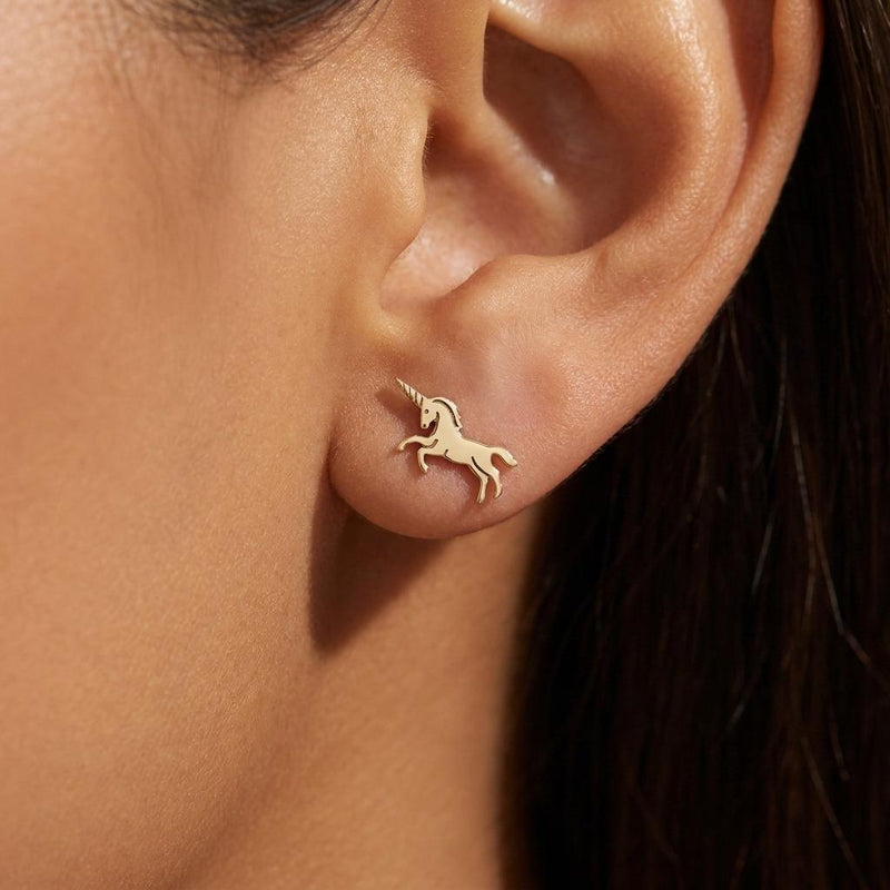 Pair of very small gold unicorn head stud earrings with a horn and mane. (2 of 7)