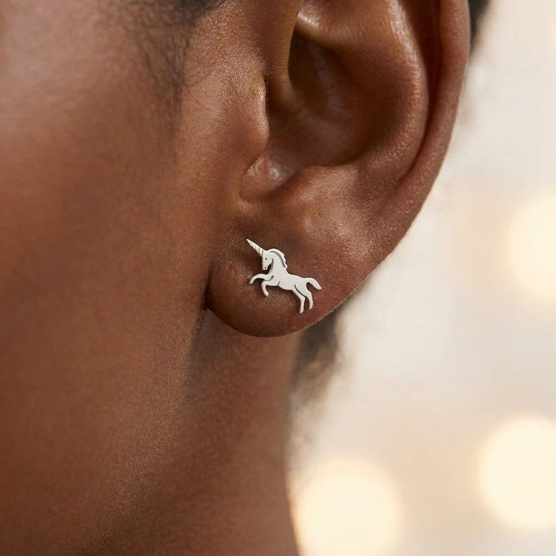 Pair of very small gold unicorn head stud earrings with a horn and mane. (3 of 7)