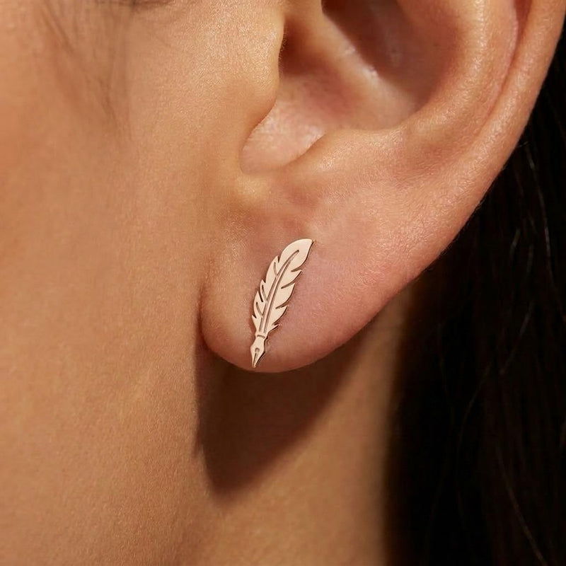 Pair of gold feather quill stud earrings with the nib pointing down (7 of 11)