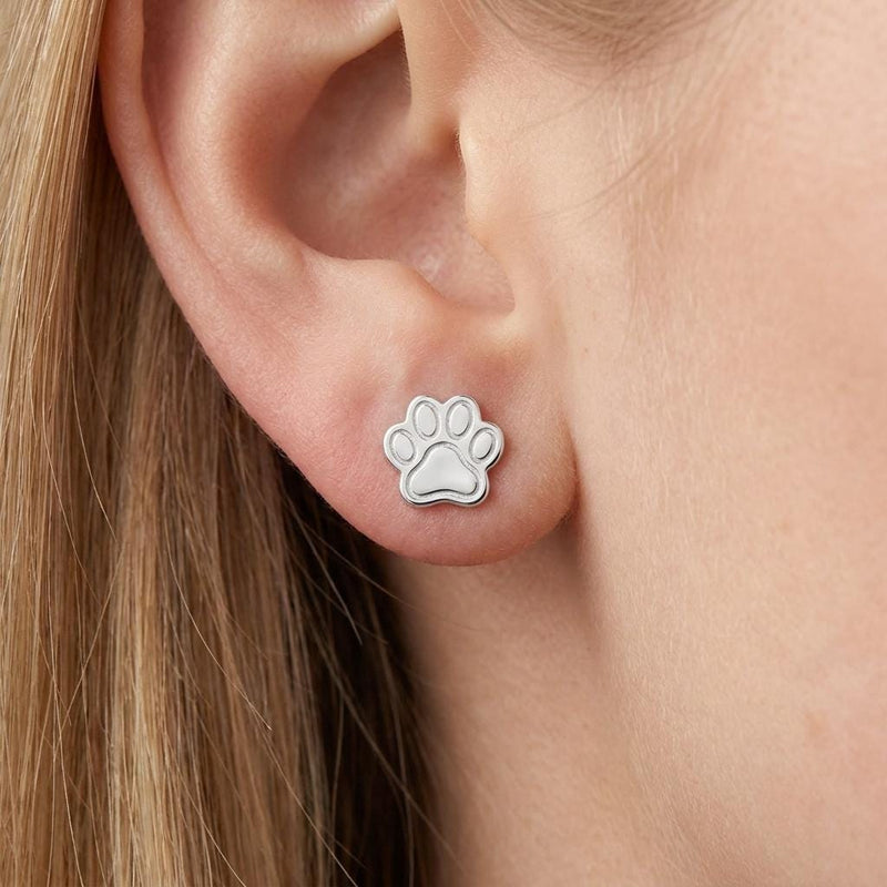 Pair of tiny gold paw print stud earrings with four toes and a rounded pad (3 of 10)