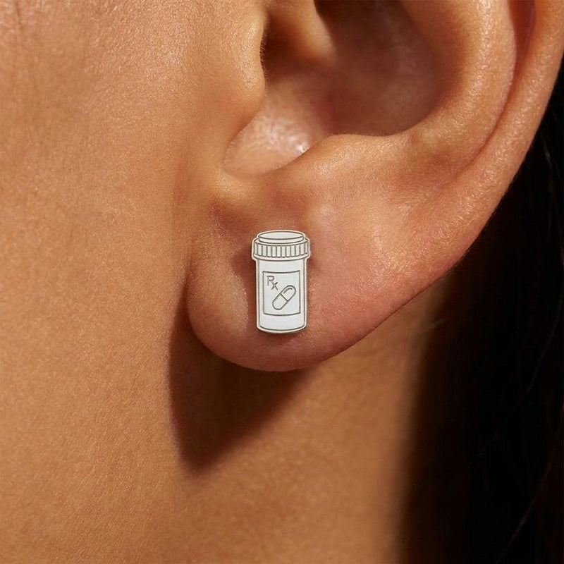 Small gold prescription pill bottle stud earrings with cap detail, shown as a pair (3 of 8)