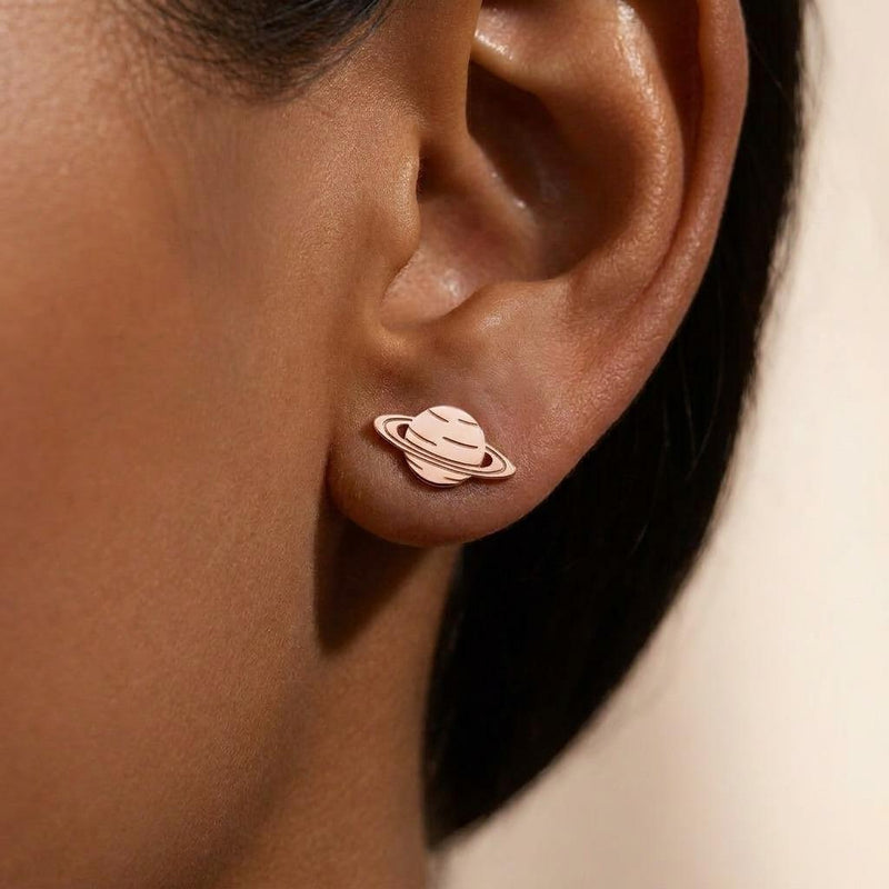 Pair of small tilted Saturn planet stud earrings in polished gold (5 of 9)