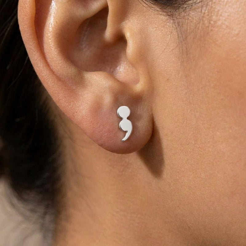 Pair of tiny gold semicolon stud earrings with a dot above a comma (4 of 7)
