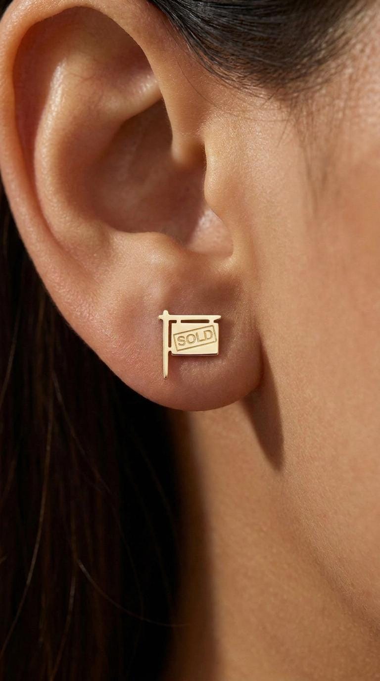 Pair of small gold yard sign stud earrings with the word SOLD cut into the face (2 of 7)