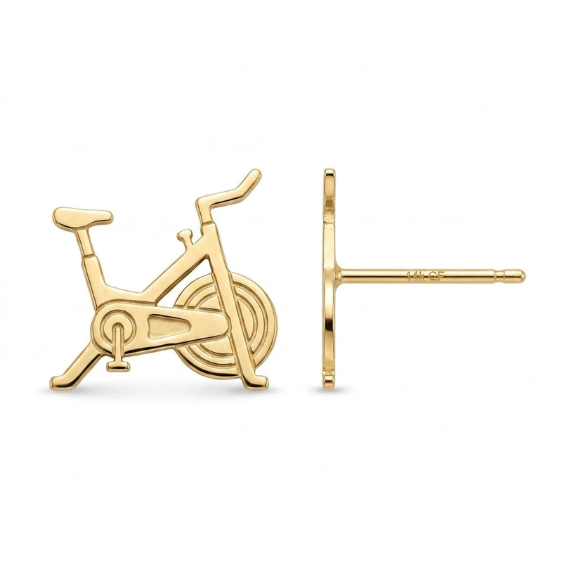 Pair of gold stud earrings shaped like a stationary exercise bike