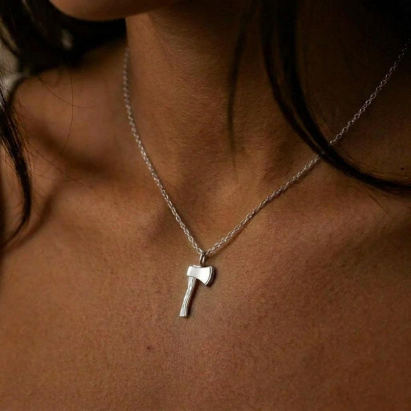 Small gold axe pendant with curved blade and slim handle on a thin chain (4 of 7)
