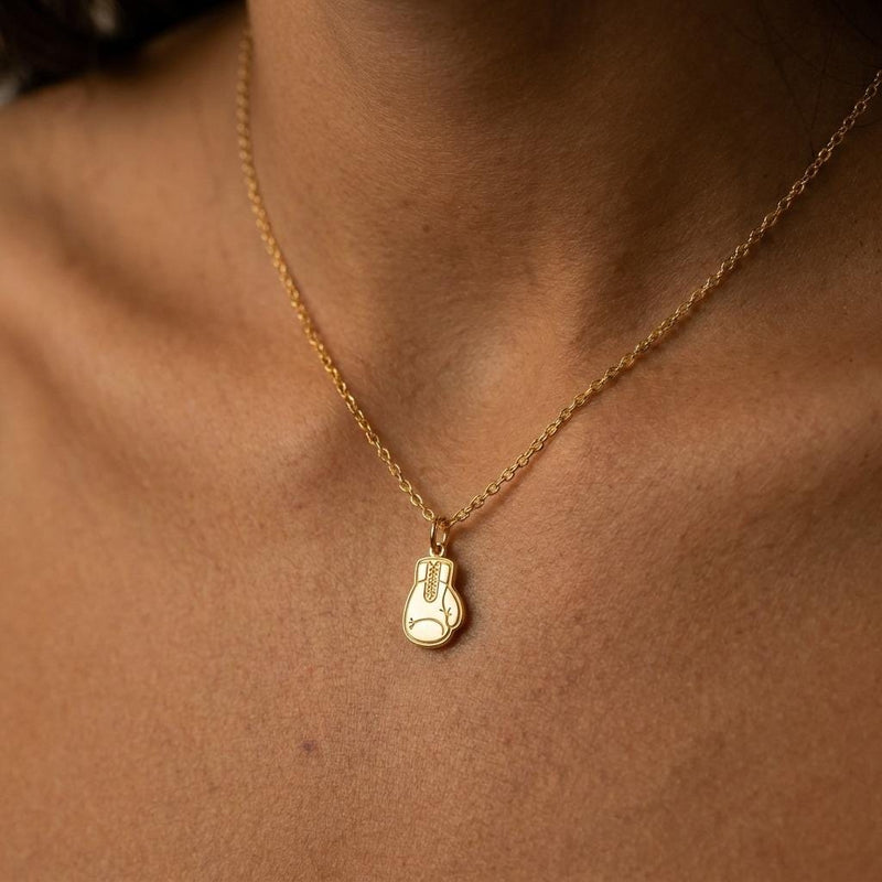 Gold boxing gloves charm necklace with two laced gloves on a fine cable chain (6 of 9)