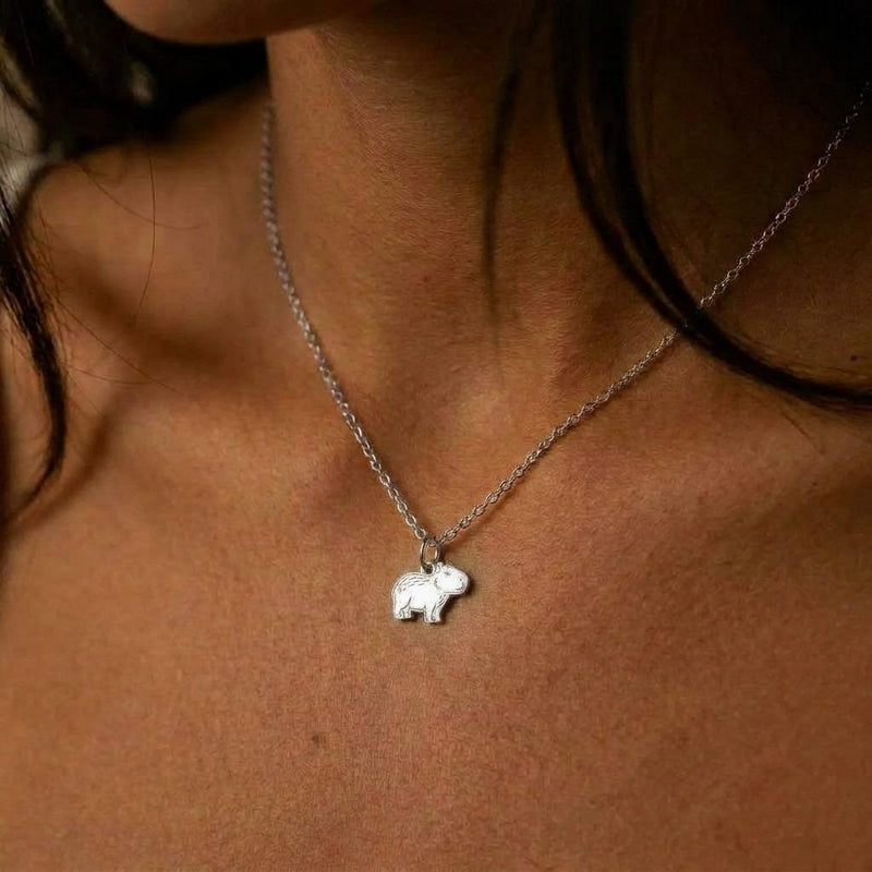 Tiny gold capybara pendant on a fine cable chain with a lobster clasp (5 of 8)