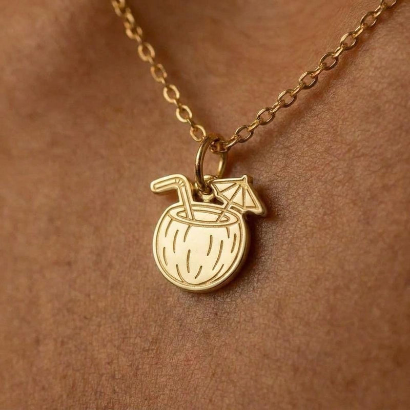 Gold coconut drink charm necklace with straw and cocktail umbrella on a fine chain