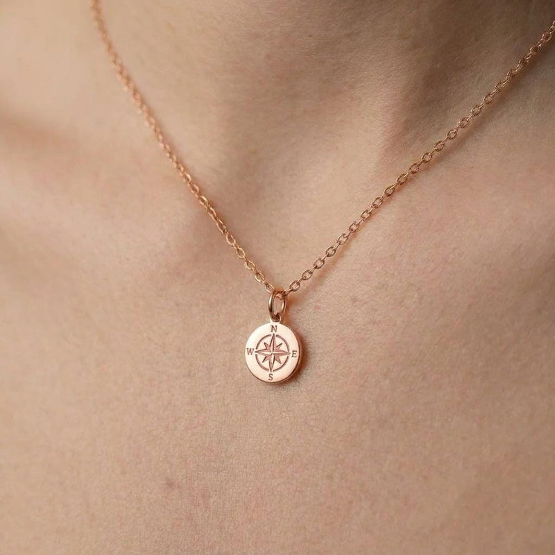 Tiny gold compass pendant with needle detail on a fine cable chain (3 of 7)