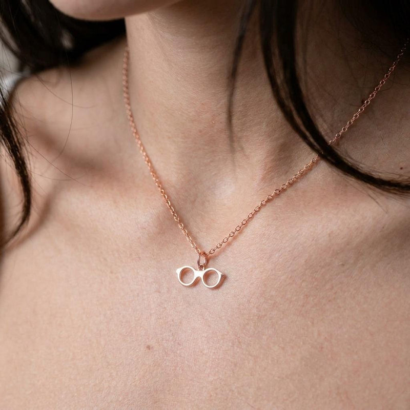 Fine gold chain necklace with a small round eyeglasses pendant (4 of 9)