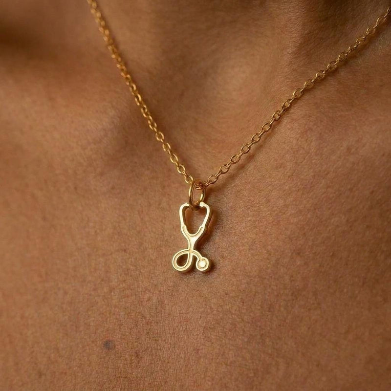 Gold stethoscope charm necklace with looped tubing and bell, on a fine chain (2 of 7)