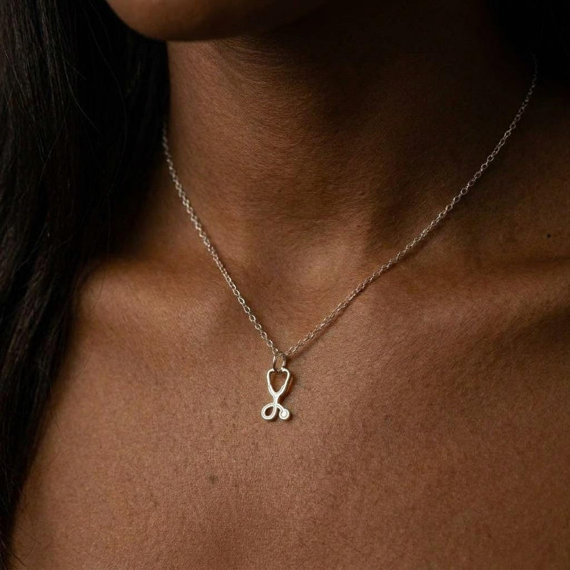 Gold stethoscope charm necklace with looped tubing and bell, on a fine chain (3 of 7)