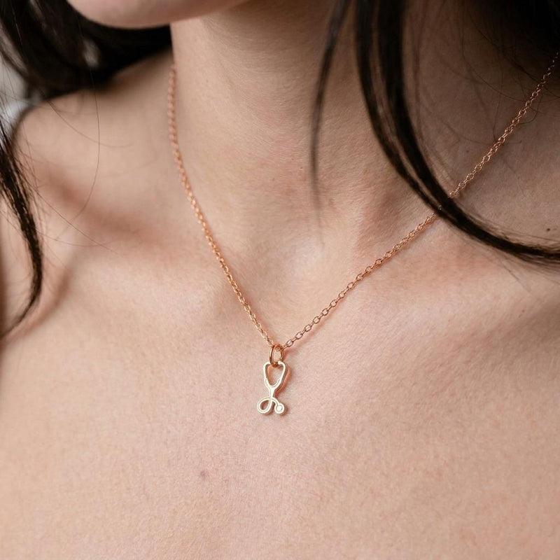 Gold stethoscope charm necklace with looped tubing and bell, on a fine chain (4 of 7)