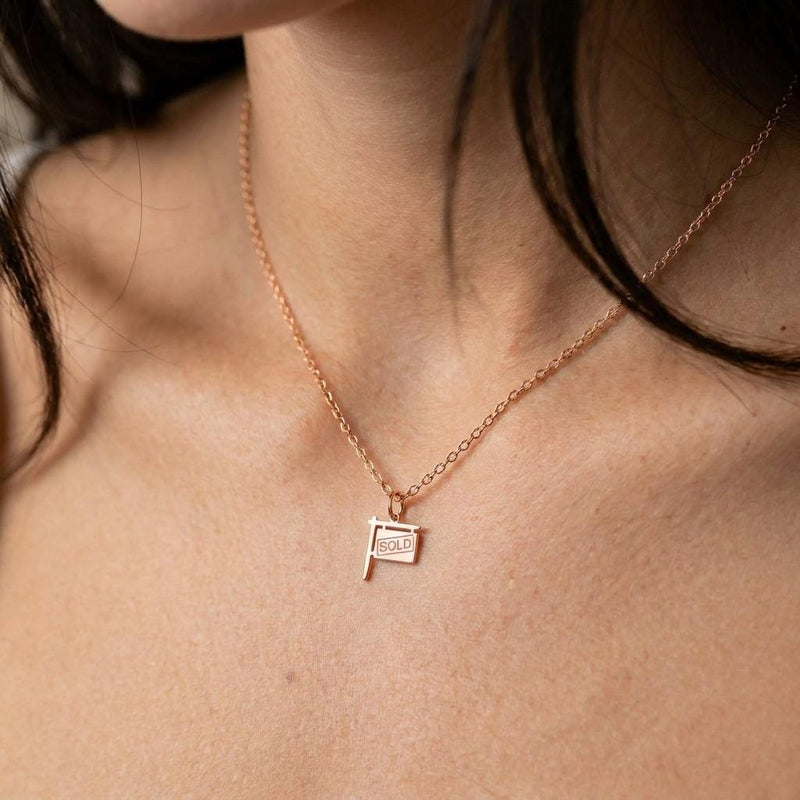 Gold yard sign charm necklace reading SOLD, on a fine cable chain (2 of 7)