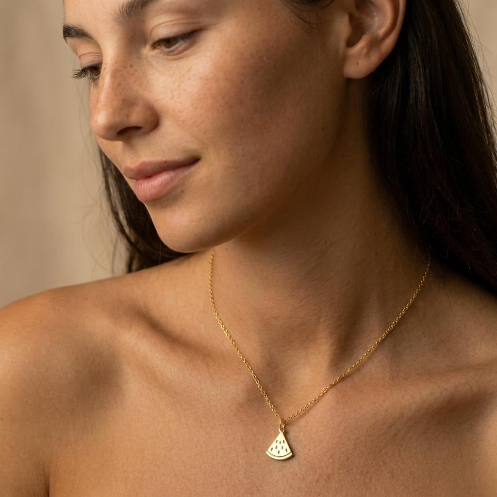 Small gold watermelon slice pendant with seed detail on a fine chain (2 of 9)