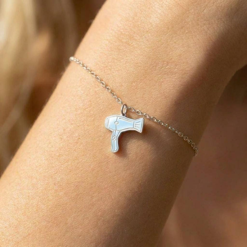 Fine gold chain bracelet with a small hair dryer charm with a curled cord (3 of 7)