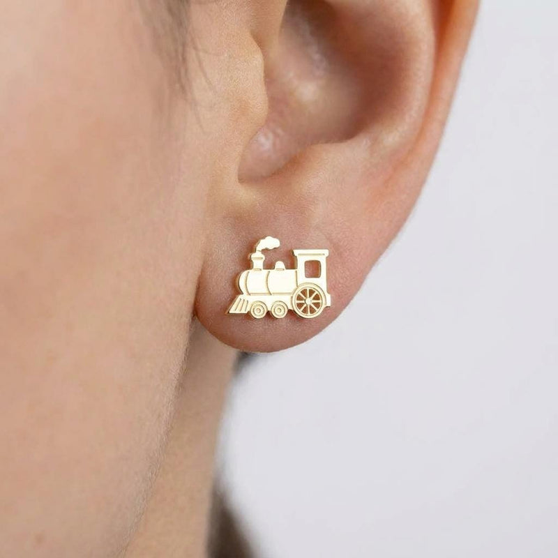 Pair of small steam train engine stud earrings in gold, shown from the side (2 of 8)