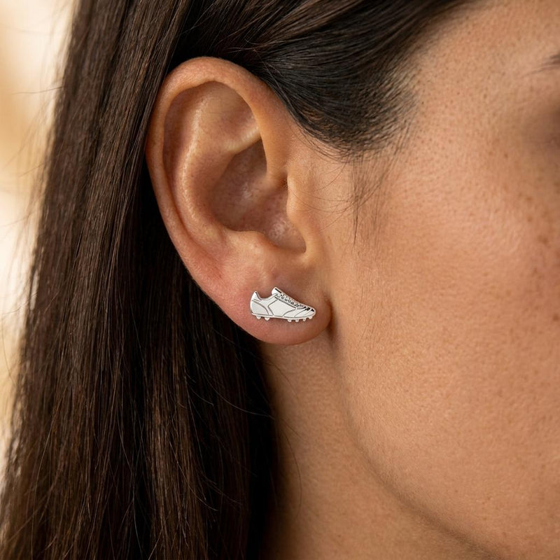 Pair of gold soccer cleat stud earrings shown in profile with lace detail (3 of 8)