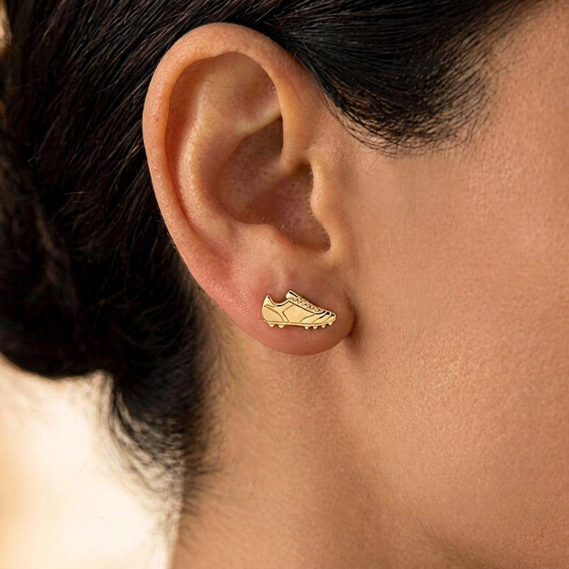 Pair of gold soccer cleat stud earrings shown in profile with lace detail (5 of 8)