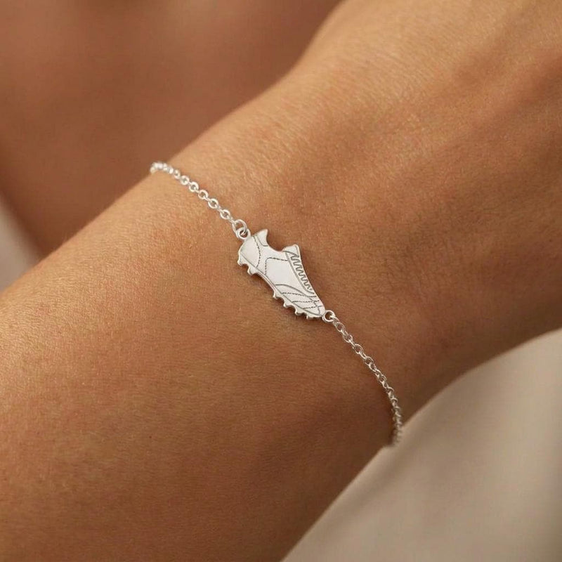 Fine gold chain bracelet with a small soccer cleat charm and lobster clasp (2 of 6)