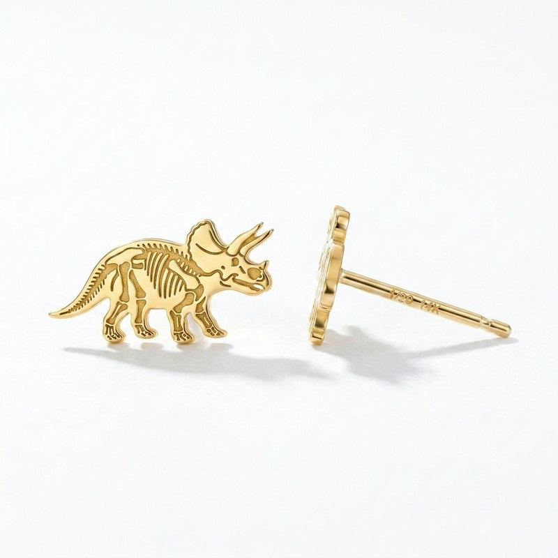 Pair of gold triceratops skeleton stud earrings with horns and frill