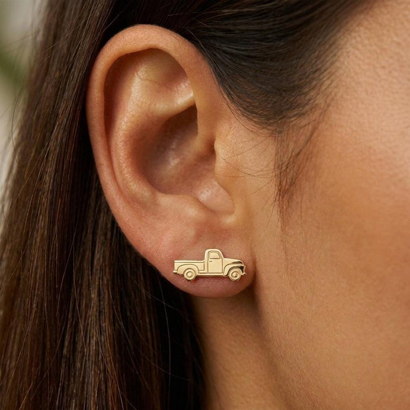 Pair of small gold vintage pickup truck stud earrings, shown on white (6 of 9)