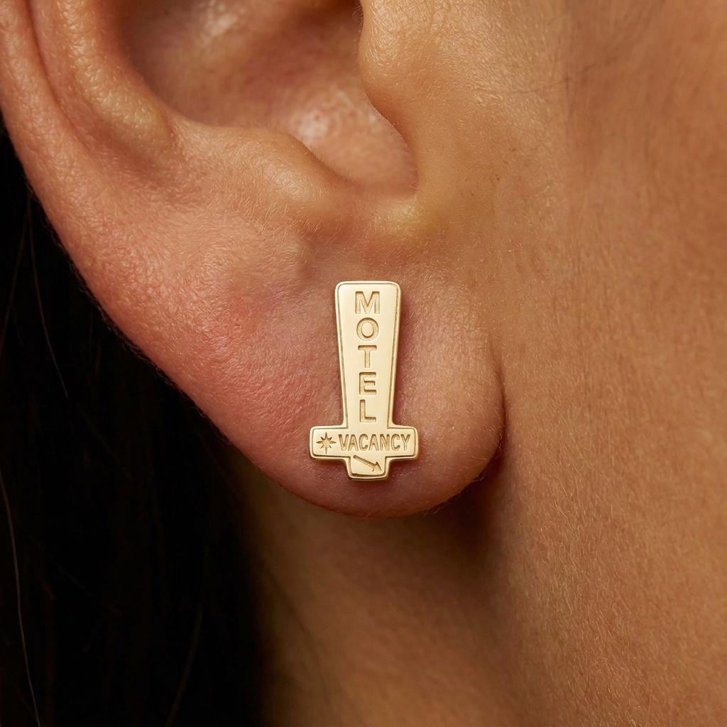 Pair of gold stud earrings shaped like a tall roadside motel sign reading vacancy (2 of 9)