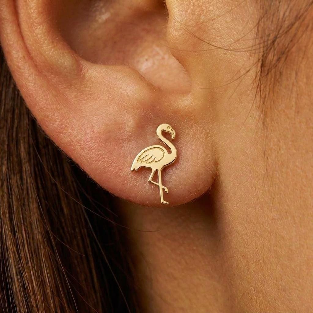 Small gold flamingo stud earrings standing on one leg with curved neck (2 of 8)