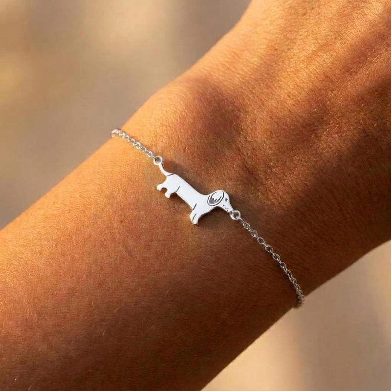 Fine gold chain bracelet with a small dachshund dog charm and lobster clasp (2 of 6)