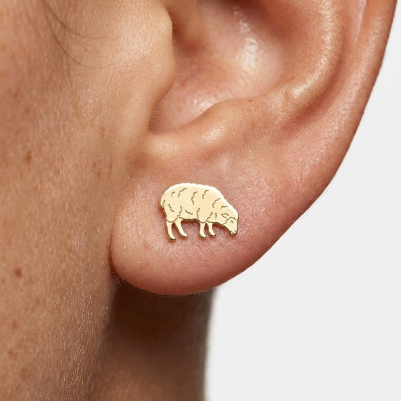 Pair of small gold sheep stud earrings with the head lowered to graze (2 of 5)