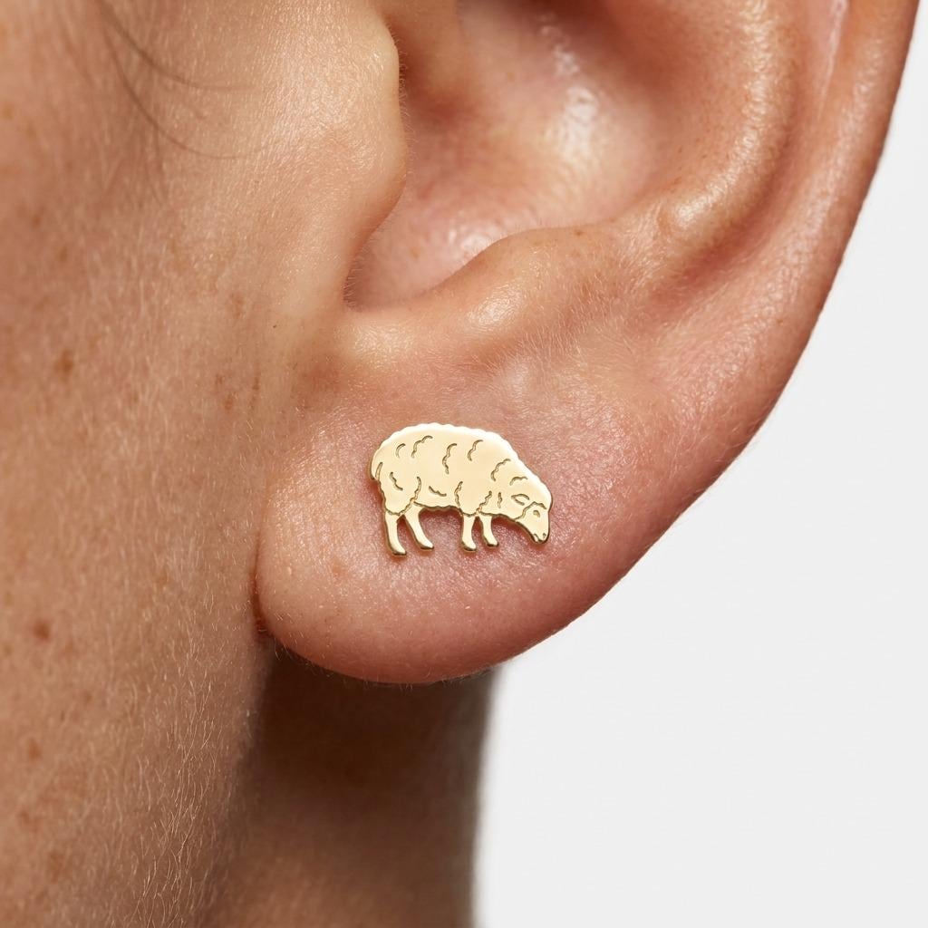 Pair of small gold sheep stud earrings with the head lowered to graze (2 of 5)
