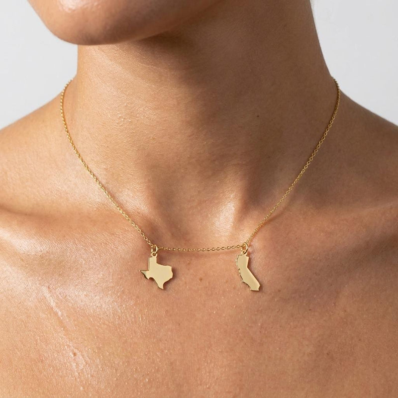 Two tiny state outline pendants on a fine gold cable chain (2 of 8)