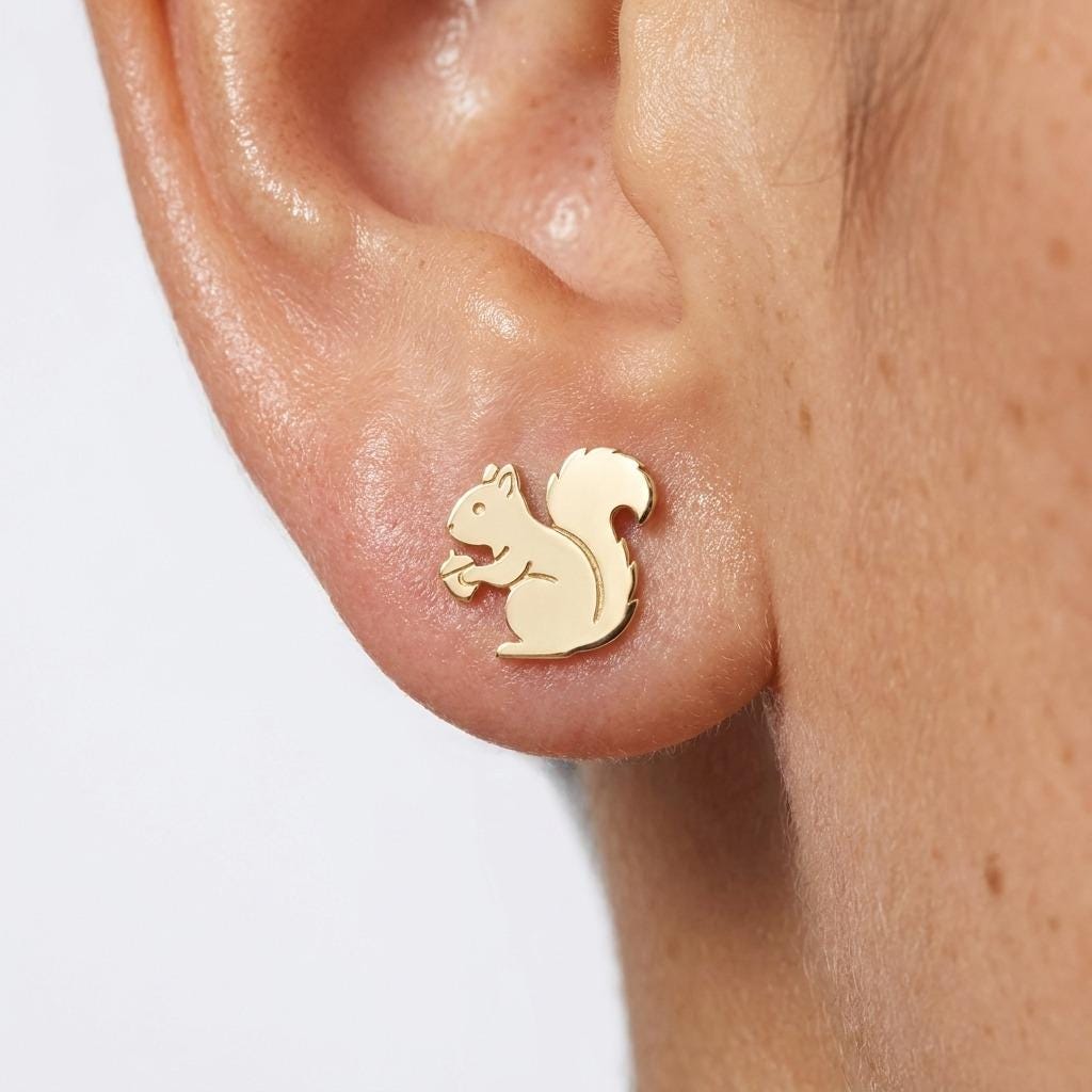 Pair of small gold squirrel stud earrings with curled tails (2 of 5)
