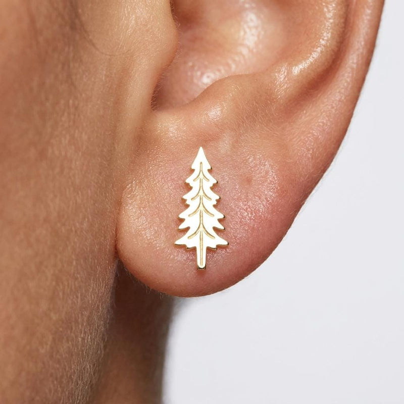Pair of small gold pine tree stud earrings on a white background (2 of 5)